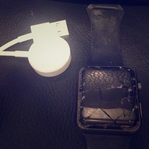 Cracked iwatch with charging cable